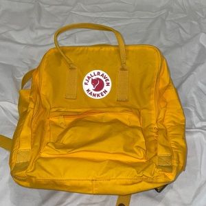 Fjallraven Kanken yellow backpack